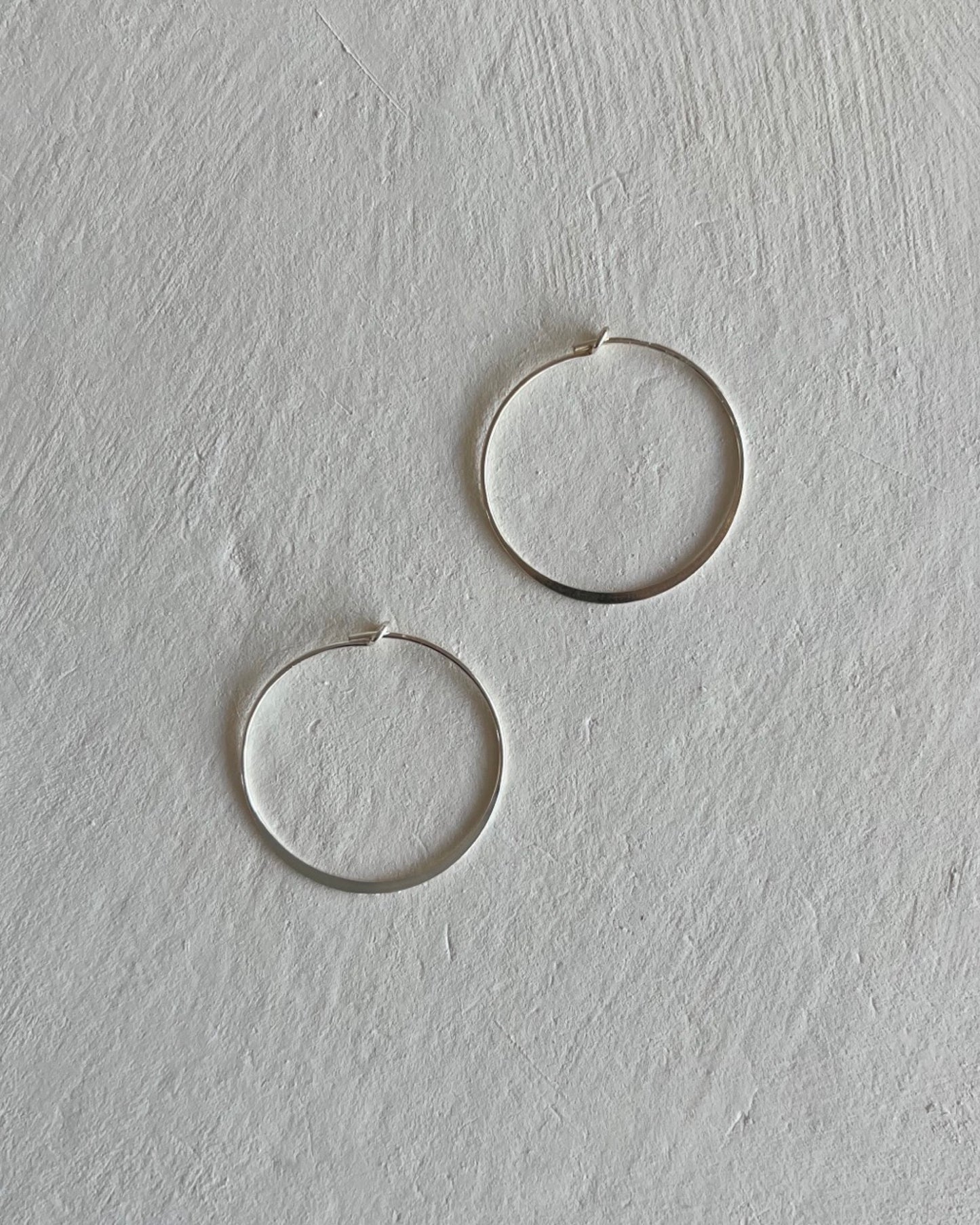 Infinity Hoops | Sterling Silver