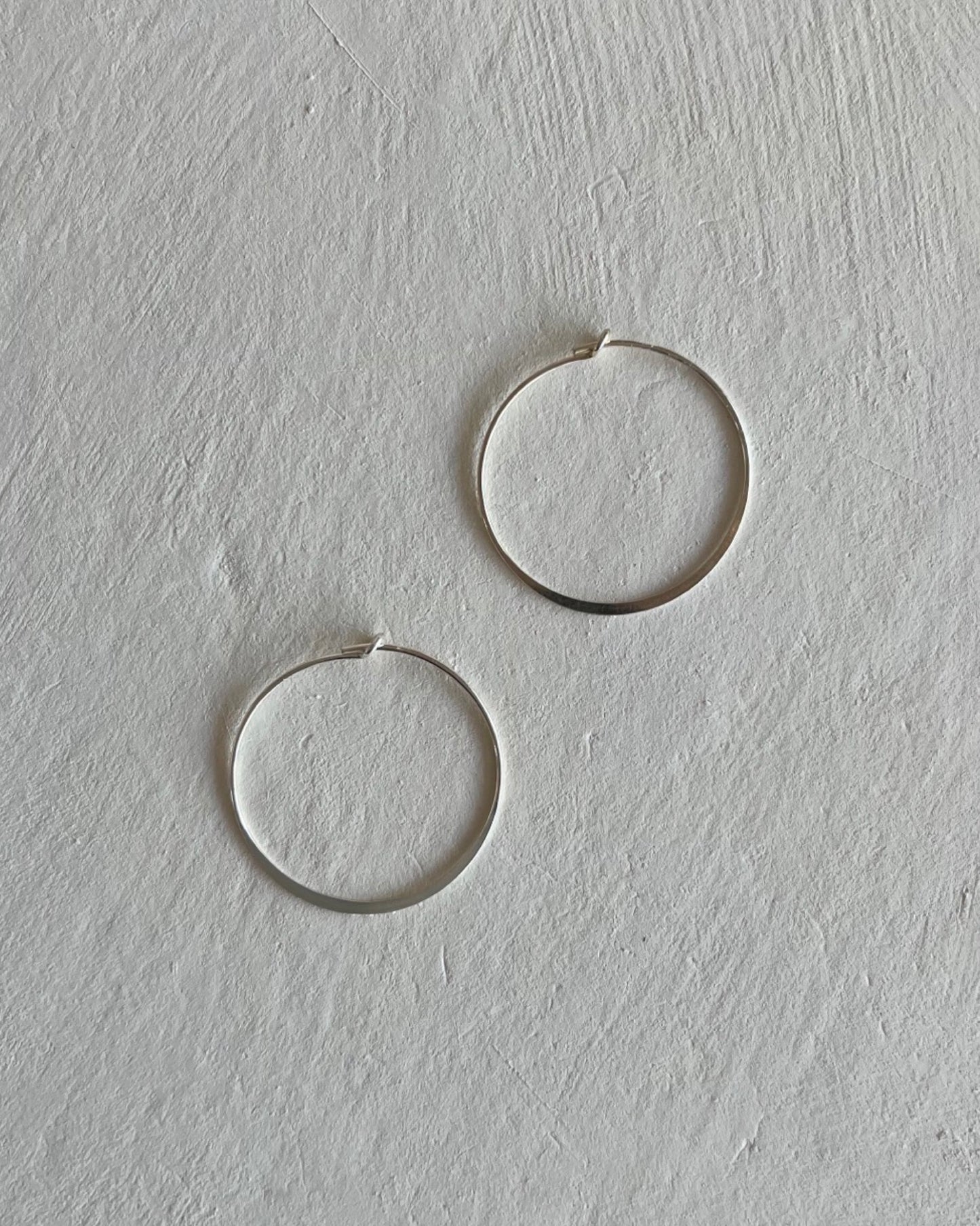 Infinity Hoops | Sterling Silver